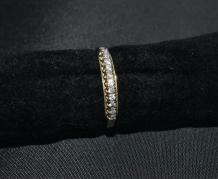 Geelgouden Riviere ring met 11 briljanten.