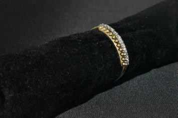 Geelgouden Riviere ring met 11 briljanten.