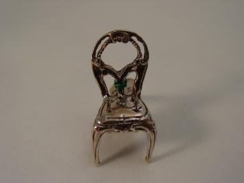 Zilveren miniatuur rond tafeltje met stoeltje